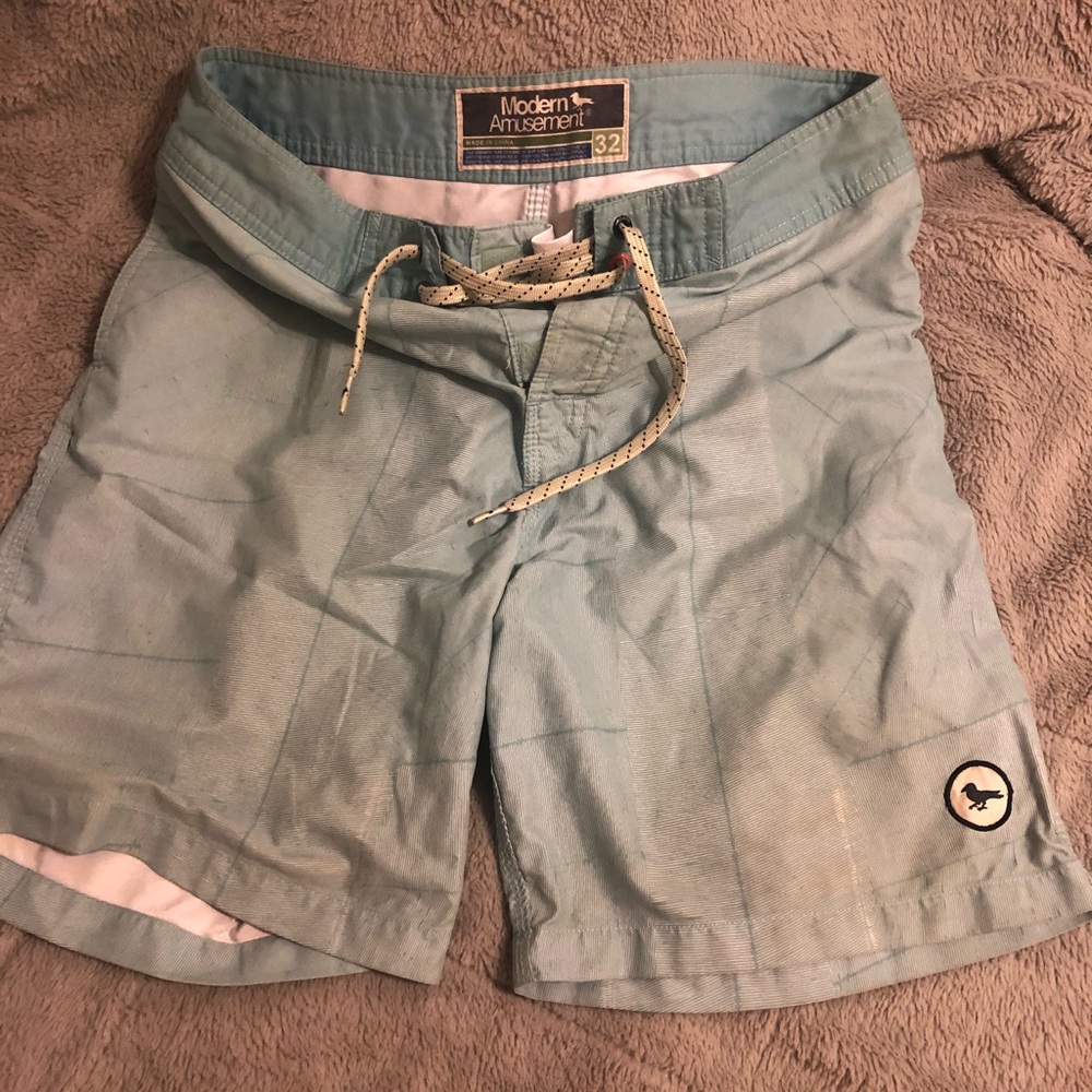 Modern amusement board shorts: light teal